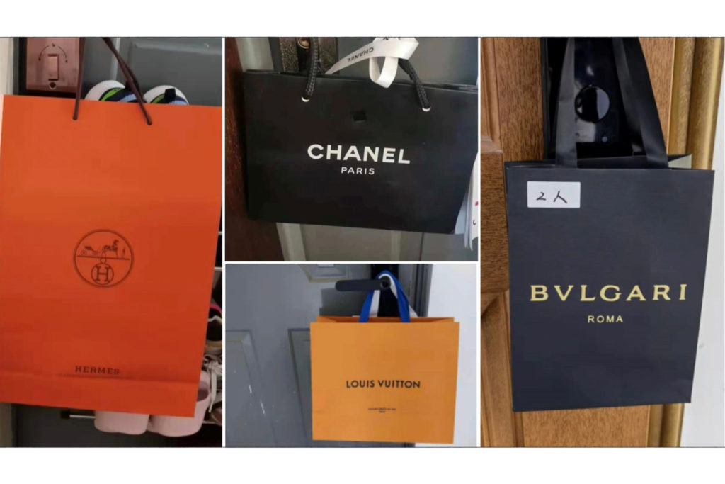 Les habitants de Shanghai confinés affichent leur richesse en accrochant  des sacs de luxe en papier à leur porte